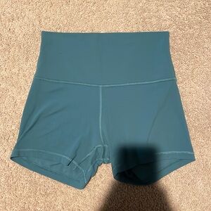Blue green Lululemon size 6 biker shorts.